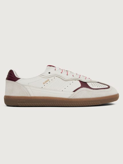 White sneaker with maroon accents.