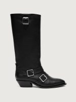 Black knee-high boot with silver buckles.