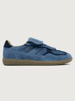 Denim blue suede low top lifestyle sneaker with navy heel detailing.