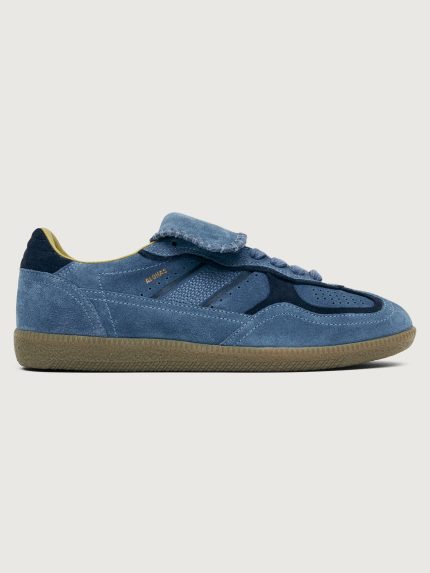Denim blue suede low top lifestyle sneaker with navy heel detailing.