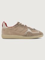 Gray/taupe low top lifestyle sneaker with red heel detail.