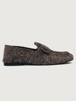 Brown suede loafer shoe.