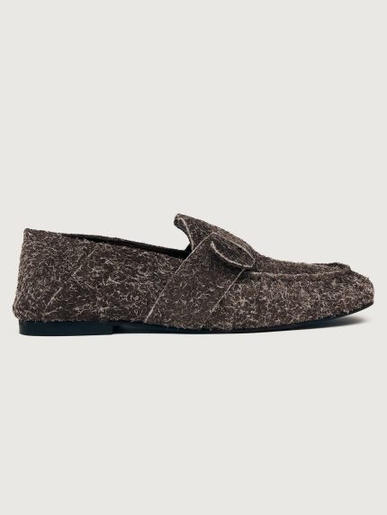 Brown suede loafer shoe.