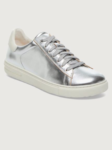 Silver sneaker with white sole.