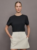 Model wears a basic black tee shirt with ringer neck and the word "Bandier" across the sleeve.