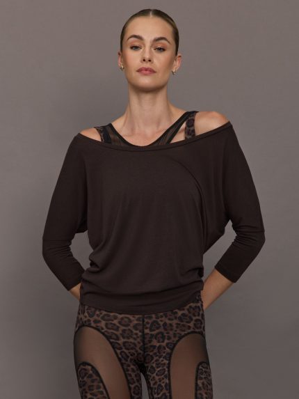 Model wearing brown off the shoulder long sleeve top