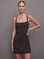 Brown leopard print athleisure dress hitting at mid thigh with double spaghetti straps.