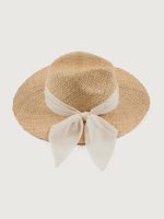 Wide-brim Emmanuelle in natural raffia hat with a light chiffon band.