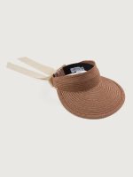 Fawn-colored visor with a wide brim and an ivory ribbon tied at the back.