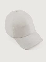 White linen baseball cap with an embroidered logo on the front and a ruched elastic back.