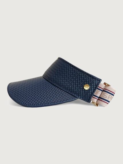 Navy basketweave textured visor with taupe colored strap and gold hardware.