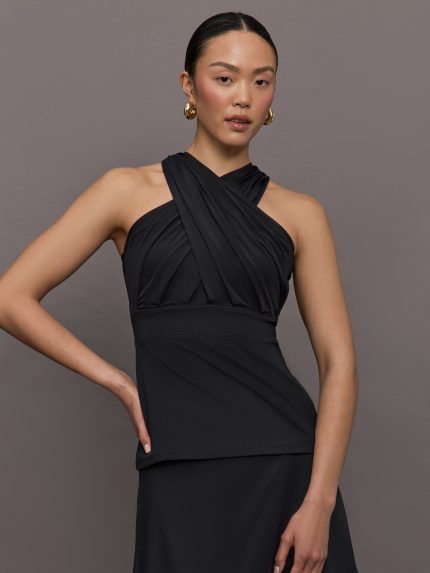 Model wears a cross-front black tank.