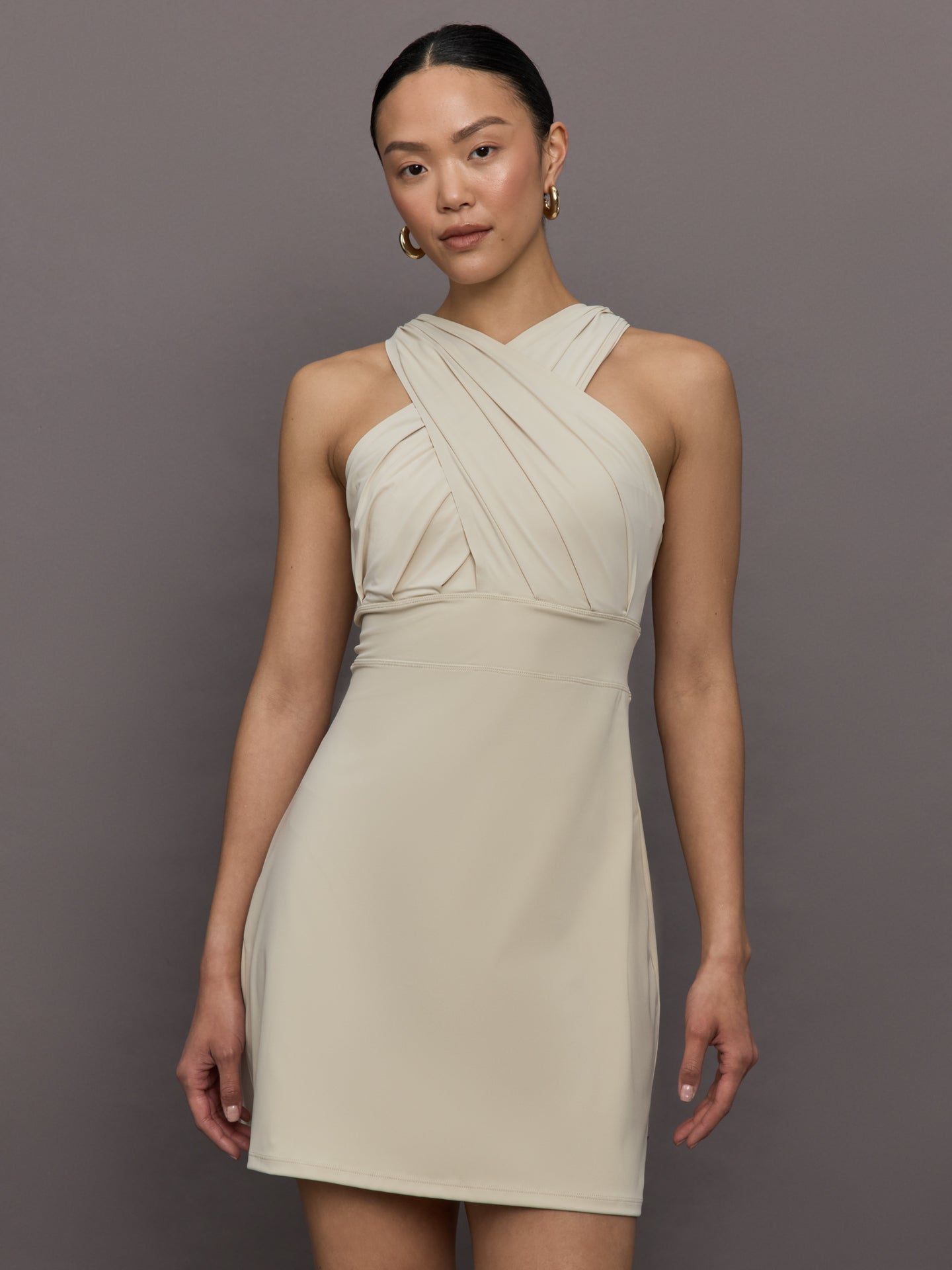 GOLD-GB350-81-251-IVRYOFFWHI-Vista-color-Champagne_8914-Edit Model wears a khaki cross front Cinched waist mini dress.