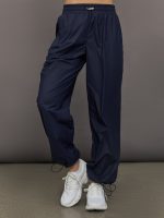Model wears a pair of Navy joggers.