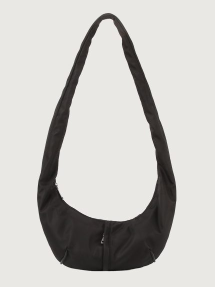 Black shoulder bag on a light gray background