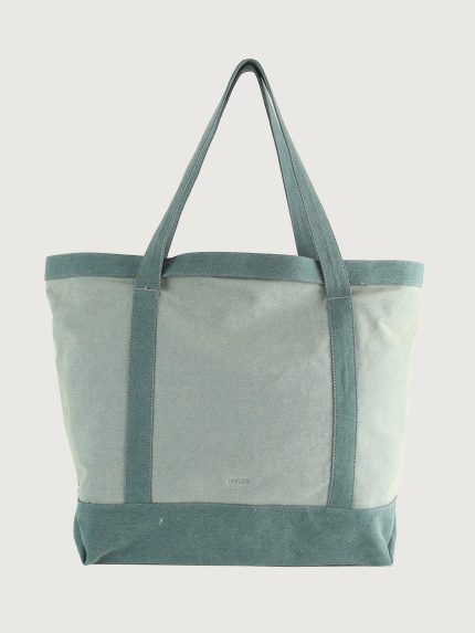 Green and gray tote bag on a light gray background