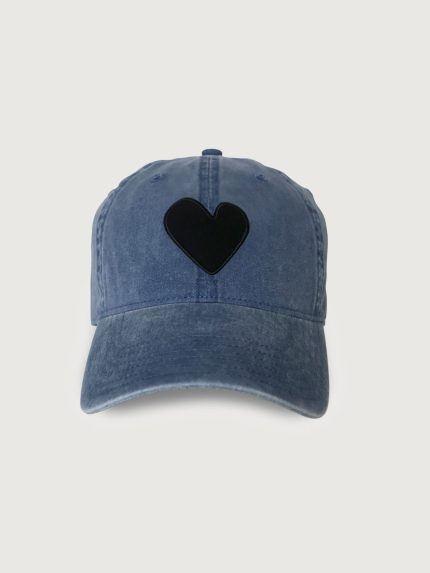 Blue denim cap with a black heart.