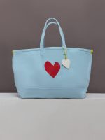 Baby blue tote with a big red heart.