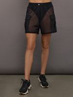 Model wears black Ares Mesh Short with a 4-inch inseam, featuring an airy, relaxed fit and fully sheer mesh construction with an elastic waistband.