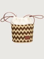 Brown & tan bucket bag with woven zig zag print and brown leather shoelace handles.