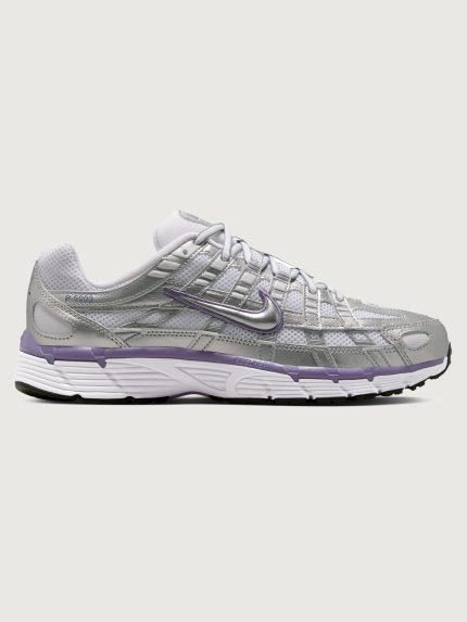 Gray running shoe with purple accents on a white background