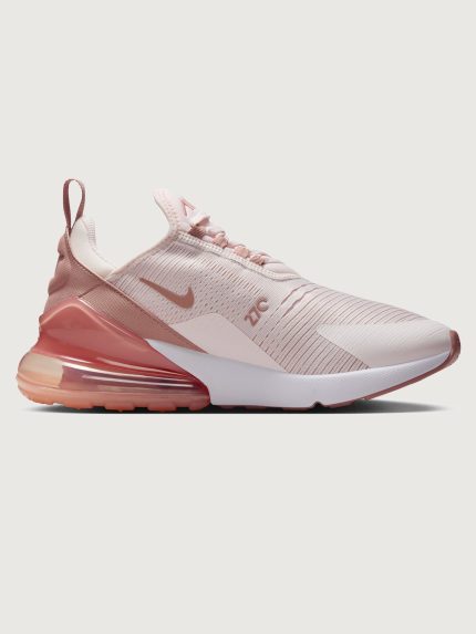 Pink and white sneaker with Nike logo.