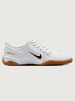 White Nike sneaker with brown sole on a white background