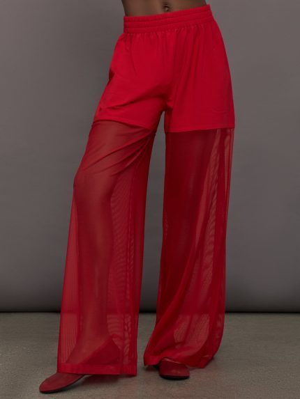 Model wears the Boyfriend Elephant Sweatpants in Tiger Red, featuring a relaxed fit with oversized legs, mesh detailing, and an elastic waistband.