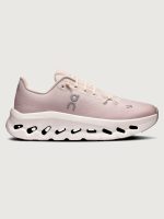 Pink running shoe with white sole on a light gray background